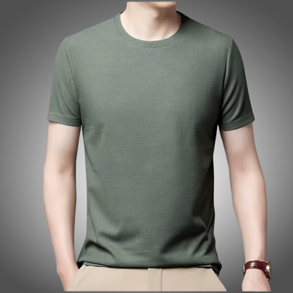 Polo liso tipo gofre de manga corta con cuello redondo para hombre