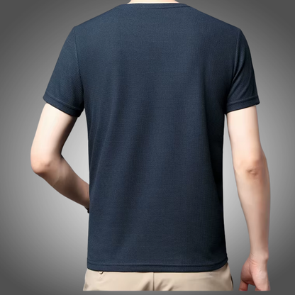Polo liso tipo gofre de manga corta con cuello redondo para hombre