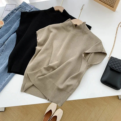 Blusa de punto con cuello alto, lisa, de manga corta