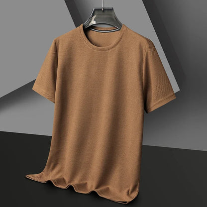 Polo liso tipo gofre de manga corta con cuello redondo para hombre