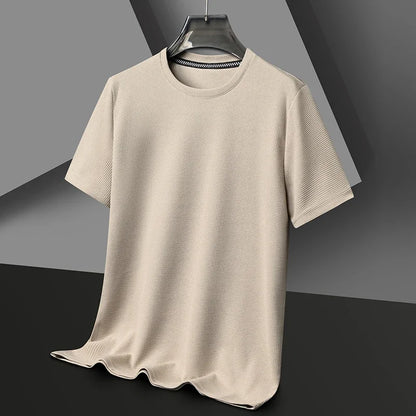 Polo liso tipo gofre de manga corta con cuello redondo para hombre