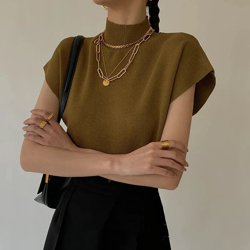 Blusa de punto con cuello alto, lisa, de manga corta