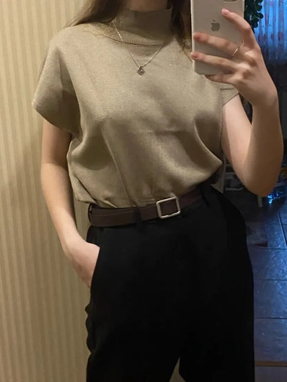 Blusa de punto con cuello alto, lisa, de manga corta