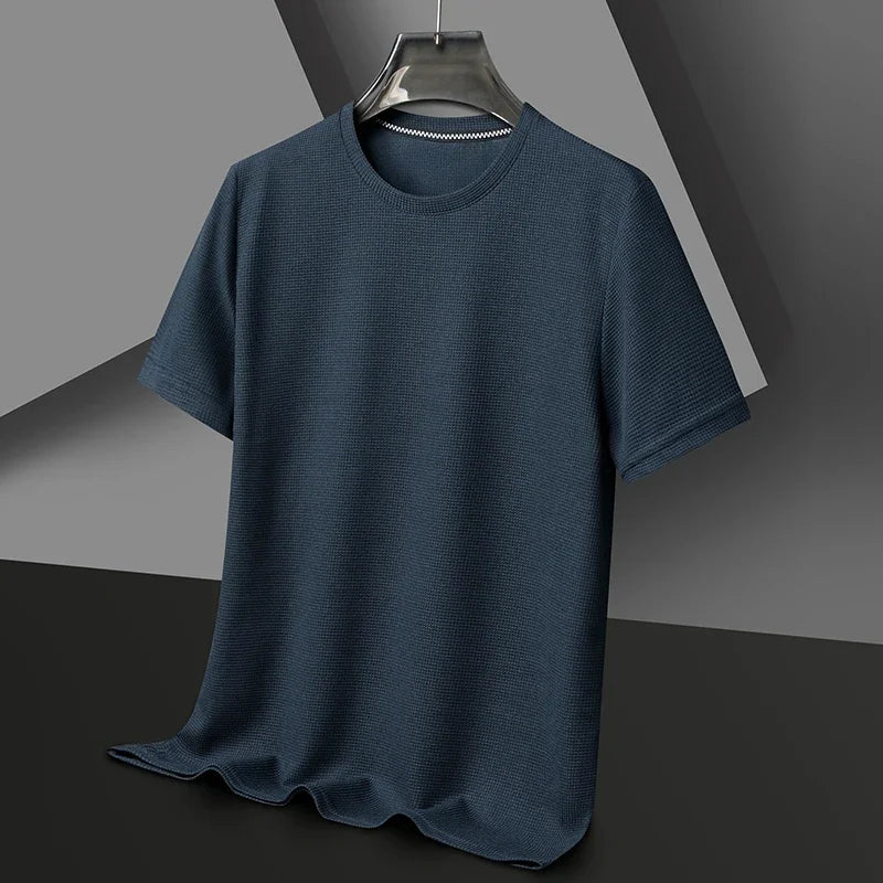 Polo liso tipo gofre de manga corta con cuello redondo para hombre