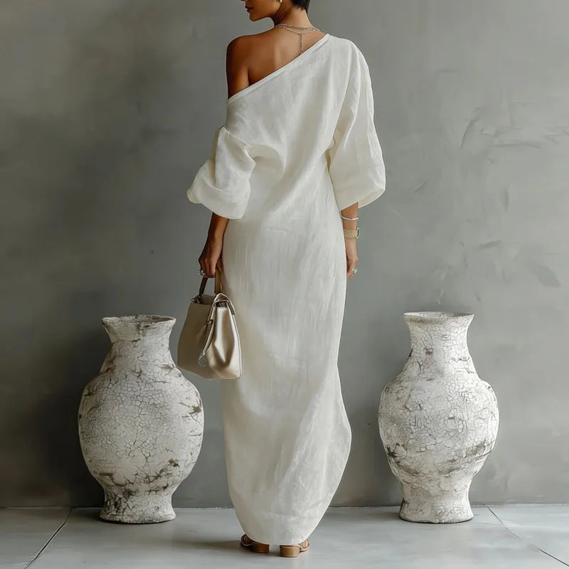 Vestido maxi sexy de manga larga con un solo hombro