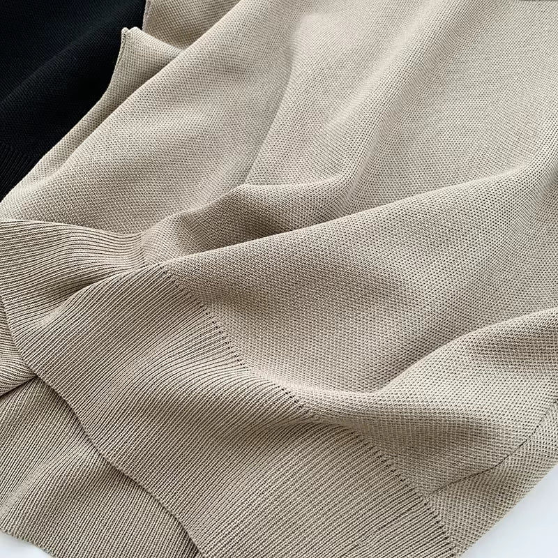 Blusa de punto con cuello alto, lisa, de manga corta