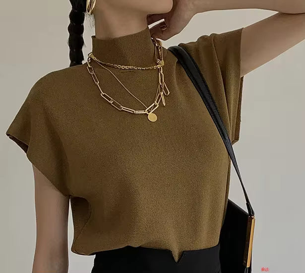 Blusa de punto con cuello alto, lisa, de manga corta