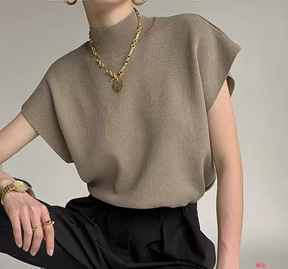 Blusa de punto con cuello alto, lisa, de manga corta