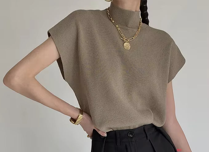 Blusa de punto con cuello alto, lisa, de manga corta