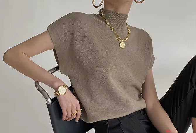 Blusa de punto con cuello alto, lisa, de manga corta