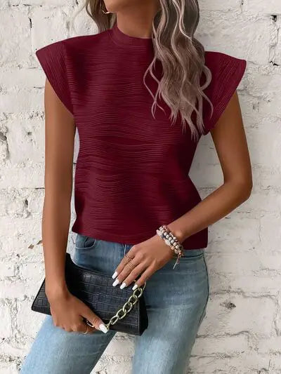 "terri: camisa de manga corta con textura"